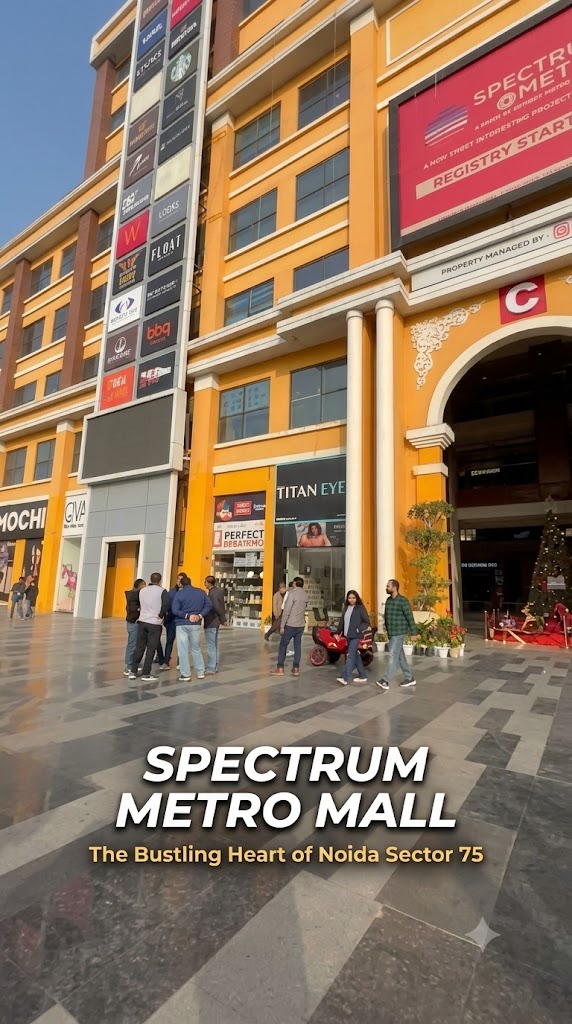 Front view of Spectrum Metro Mall on the main road in Sector 75, Noida